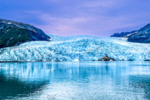 The Aialik glacier is a large sheet of ice that is up to five miles deep in places.