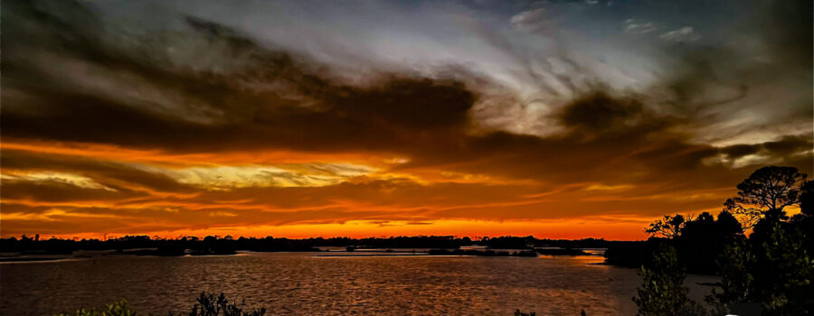 Sunset on the Florida island of Cedar Key can be especially colorful with some storm clouds on the horizon.